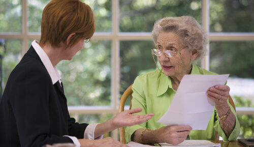 An older lady doing an advanced care plan with a professional